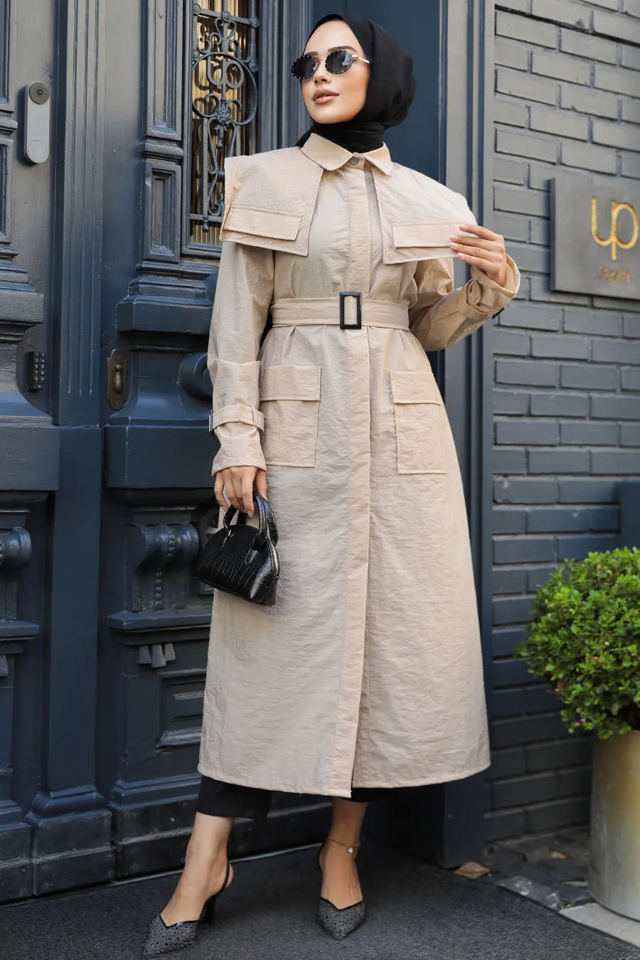 The Molly Full-Length Trench Coat redefines elegance and versatility in modest fashion