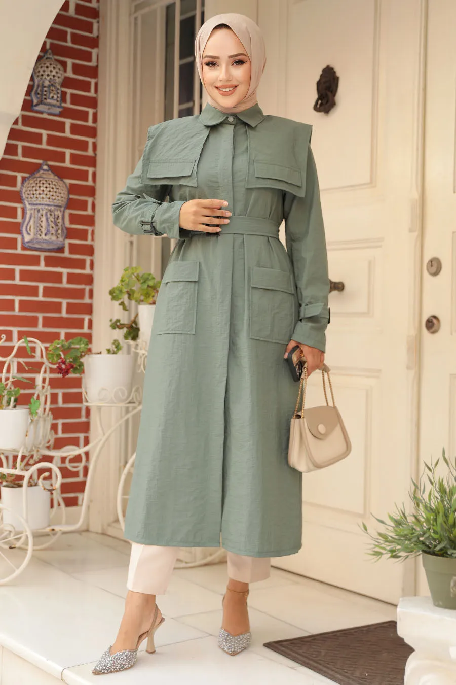 The Molly Full-Length Trench Coat redefines elegance and versatility in modest fashion