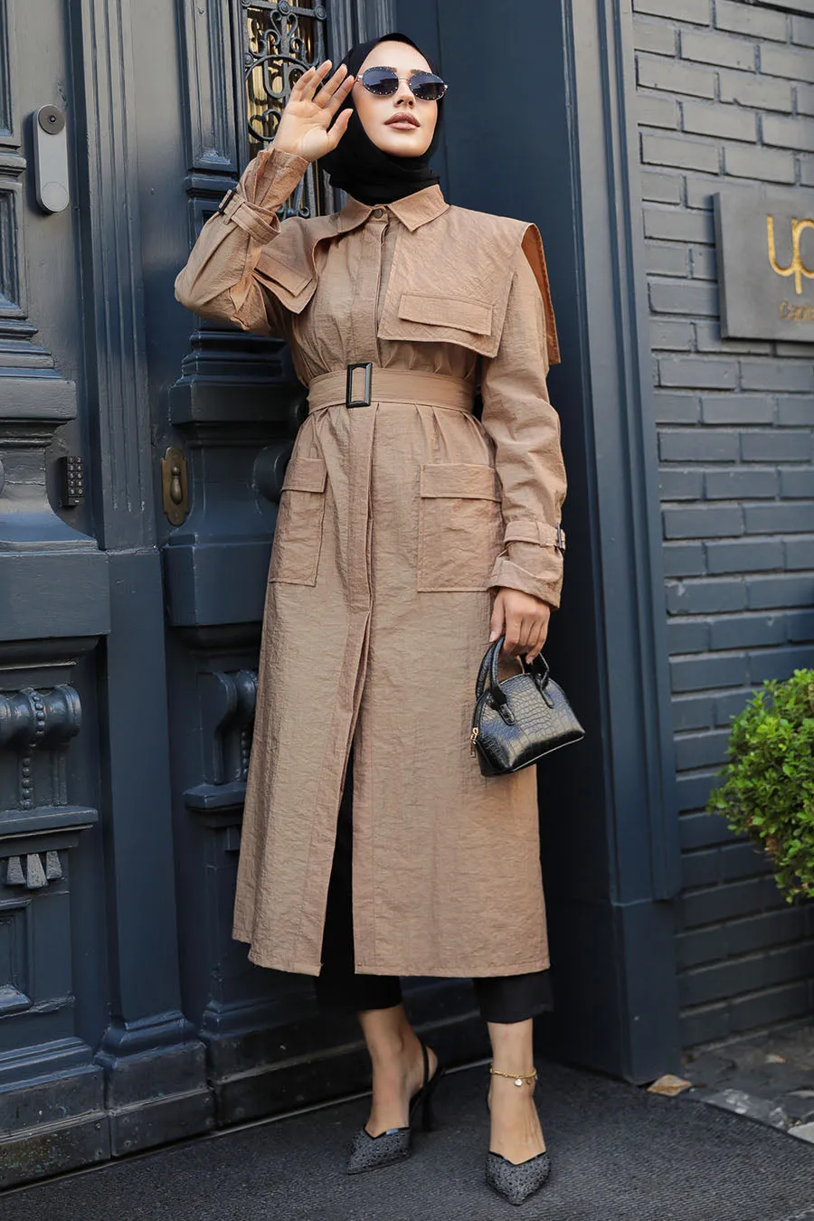 The Molly Full-Length Trench Coat redefines elegance and versatility in modest fashion