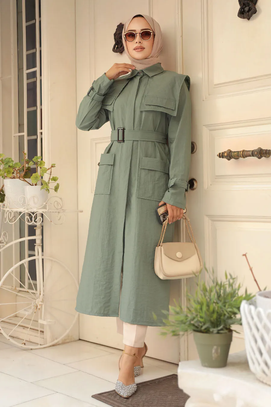 The Molly Full-Length Trench Coat redefines elegance and versatility in modest fashion