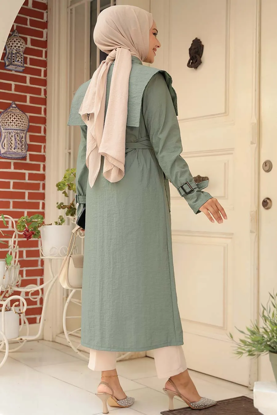 The Molly Full-Length Trench Coat redefines elegance and versatility in modest fashion