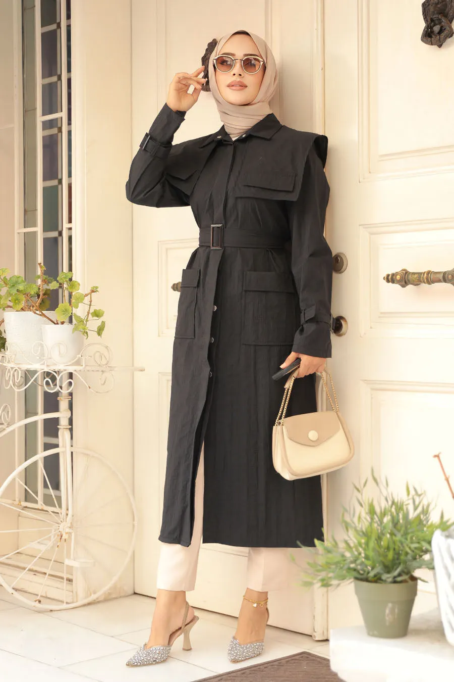 The Molly Full-Length Trench Coat redefines elegance and versatility in modest fashion